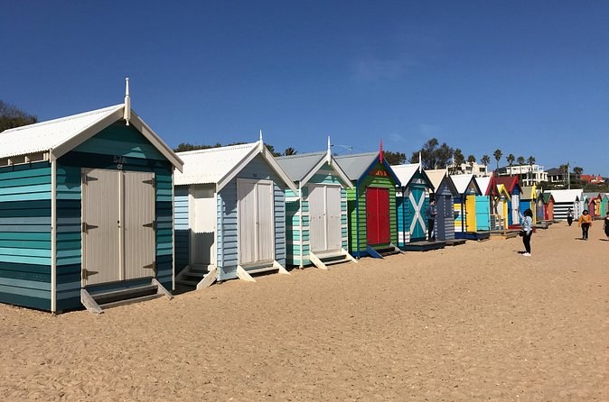The painted bathing boxes in a row along Brighton beach
